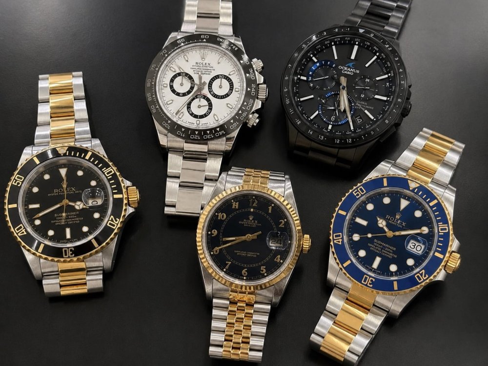 ロレックスの腕時計4本(サブマリーナー2本、デイトナ、デイトジャスト)とカシオ オシアナスを並べた画像